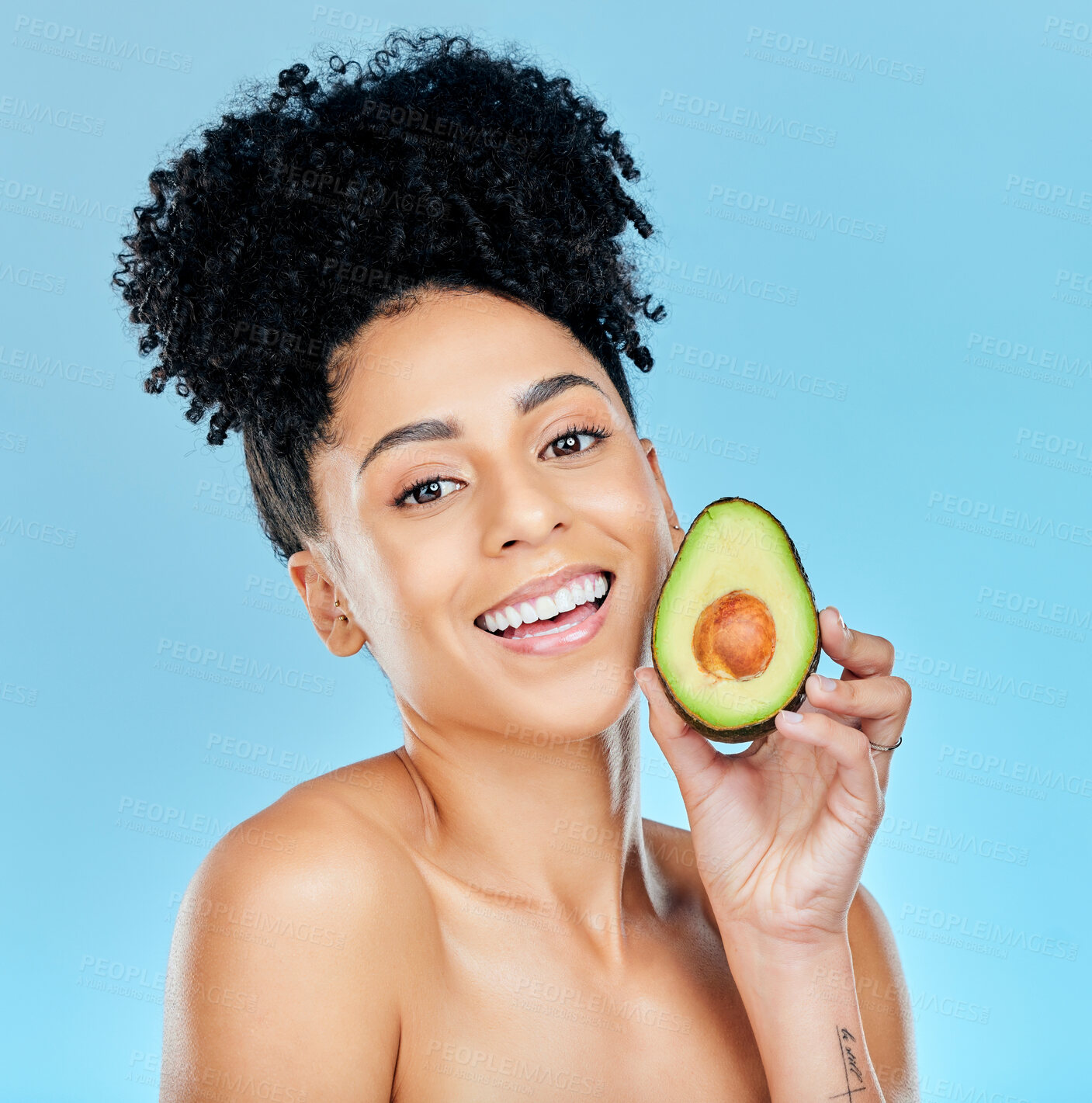 Buy stock photo Happy woman, portrait and avocado for natural skincare, beauty or diet against a blue studio background. Face of female person smile with organic vegetable for nutrition, vitamin C or skin wellness