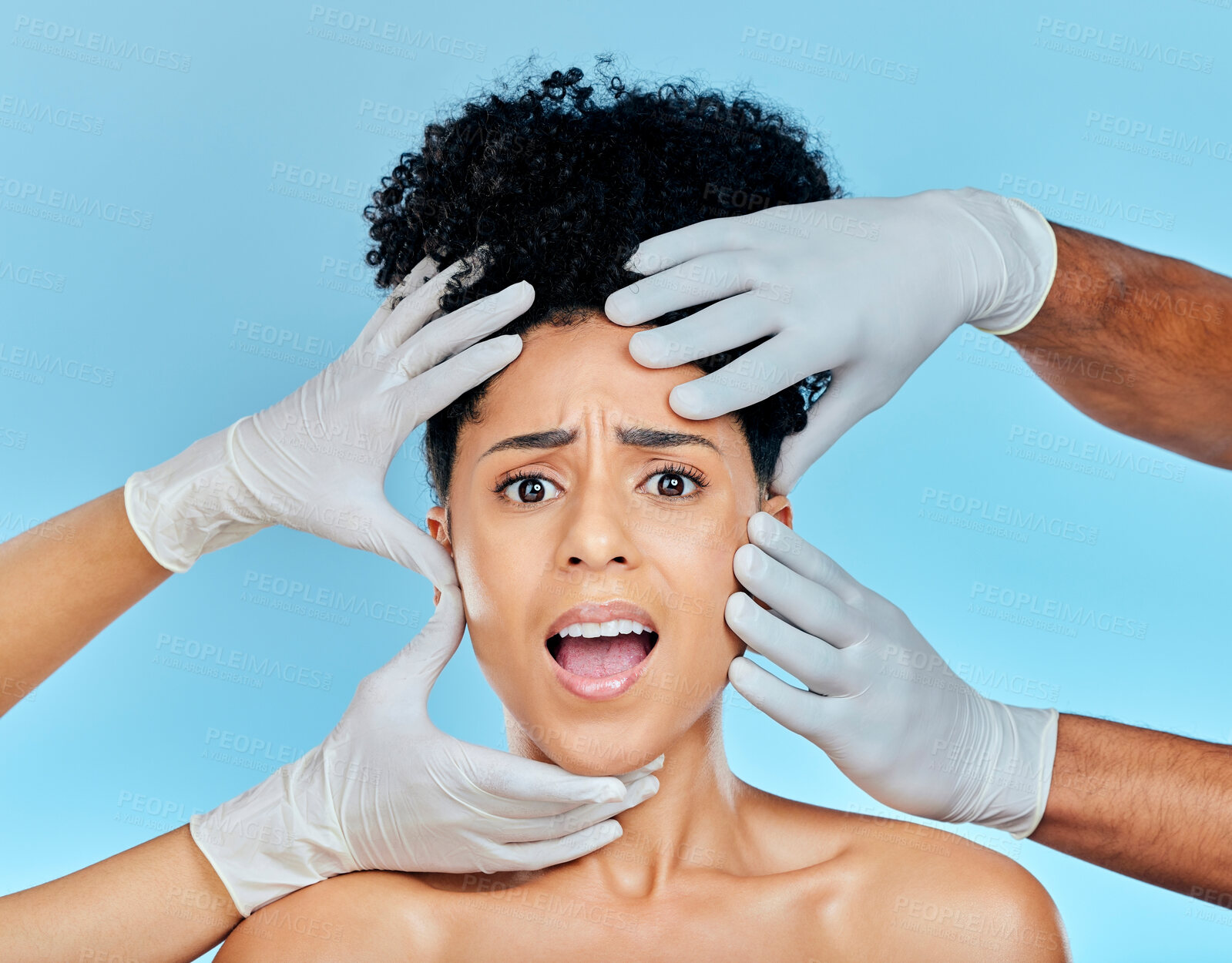 Buy stock photo Skincare, portrait of scared woman with hands on face in studio for plastic surgery consultation. Model with stress, fear and anxiety for beauty, dermatology or collagen therapy on blue background.