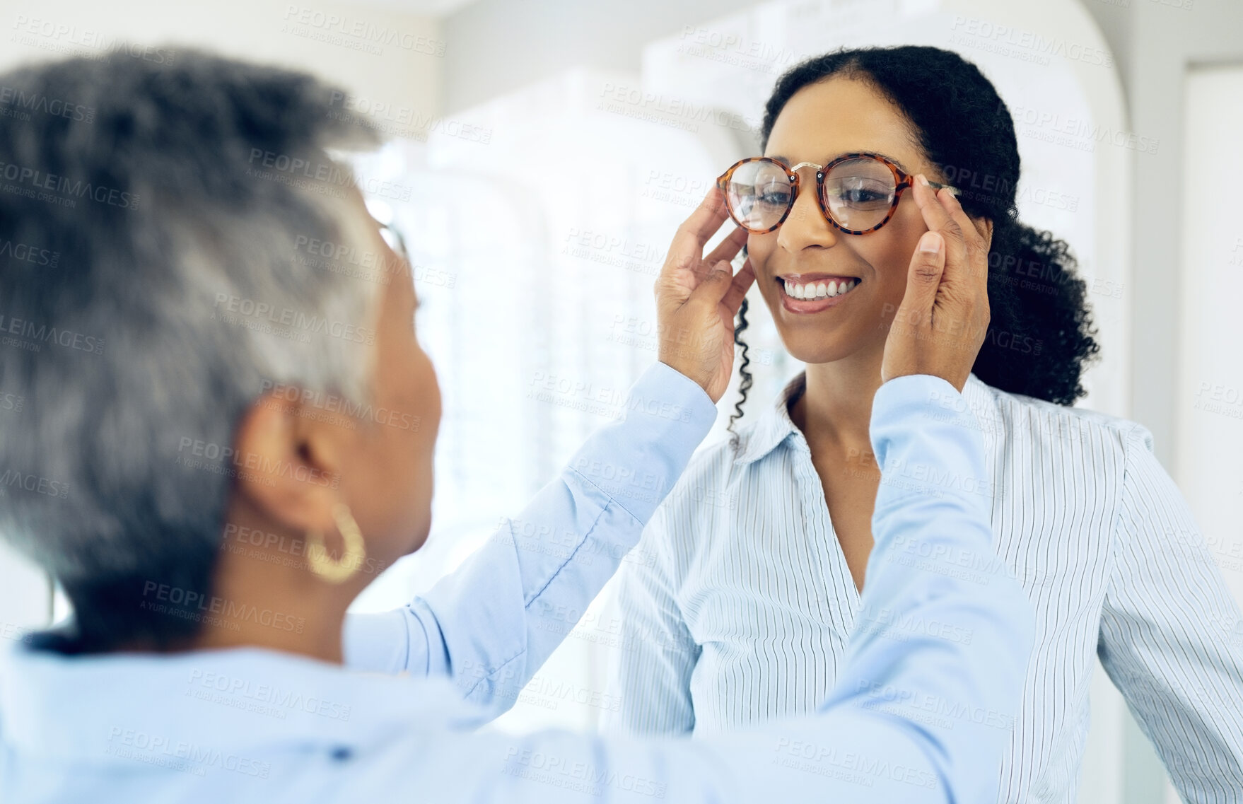 Buy stock photo Optometrist, eye care service or happy woman with glasses for vision in a retail optical or eyewear shop. Women, choice or customer with new spectacles with a mature doctor at optics clinic store