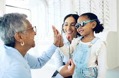 Buy stock photo High five, children and a family with a happy optometrist in a clinic for an eye exam to test for prescription frame lenses. Support, motivation or trust with a girl and her parent at the optician