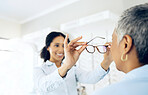 Woman, doctor and optometry for glasses with patient after eye exam in space for prescription, health and wellness. Mature person, new and lens by consultation for ophthalmology, vision or glaucoma