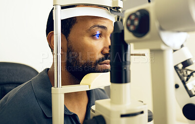 Buy stock photo Man, eye exam and ophthalmology for medical, vision and healthcare consultation with glaucoma check. African person or client with laser, blue light and machine for scanning and optometry in office