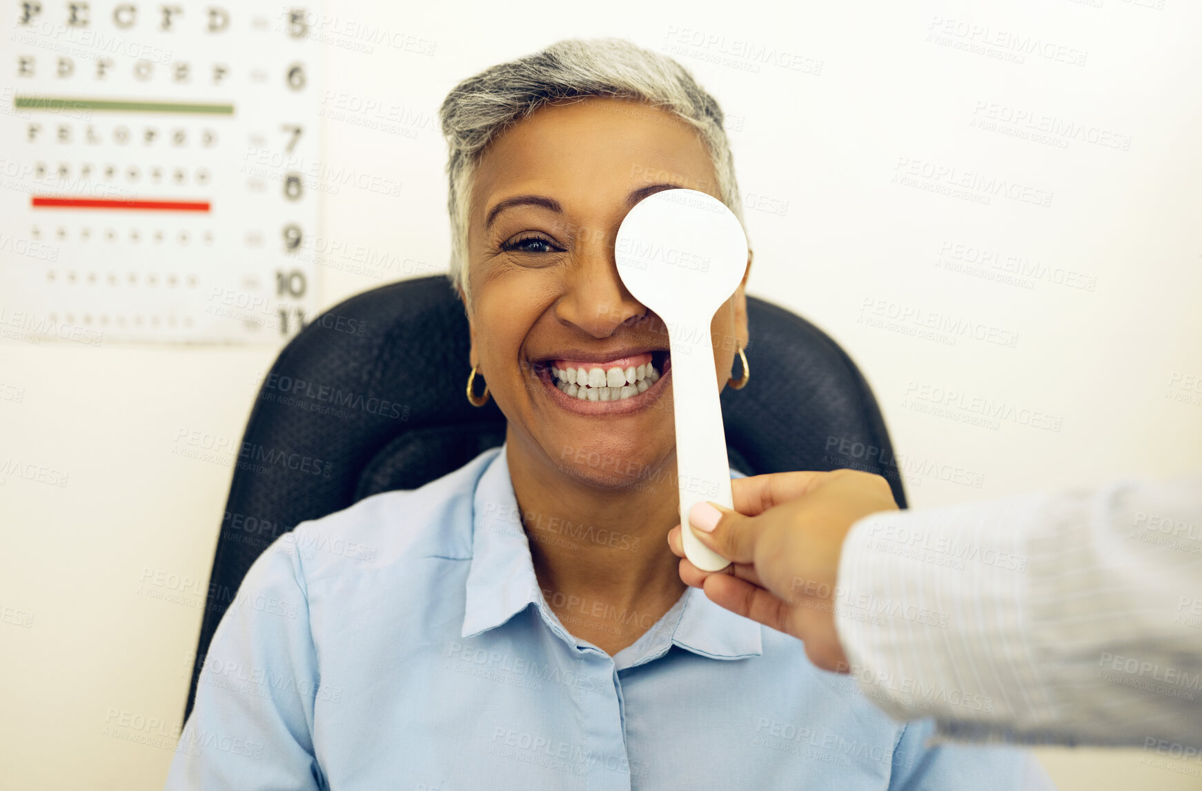 Buy stock photo Eye exam, woman or portrait with cover for vision, healthcare or test at optometrist or optometry. Eyes assessment, ophthalmology or person for medical support, glaucoma or retina testing or smile
 
