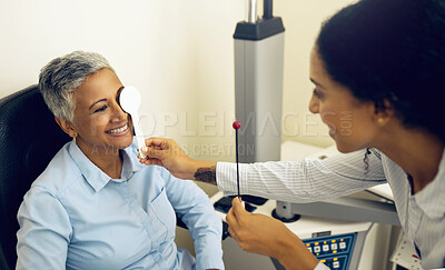 Buy stock photo Woman, eye exam and occluder with optometrist in clinic, check and lens for vision, wellness or healthcare. Doctor, eyesight tools and smile for help in assessment, consultation or cover in hospital