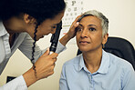 Woman, eye care and healthcare in clinic with ophthalmoscope to check for glaucoma, ocular services or assessment. Optometrist, expert and retina analysis for eyesight exam of patient with lens tools