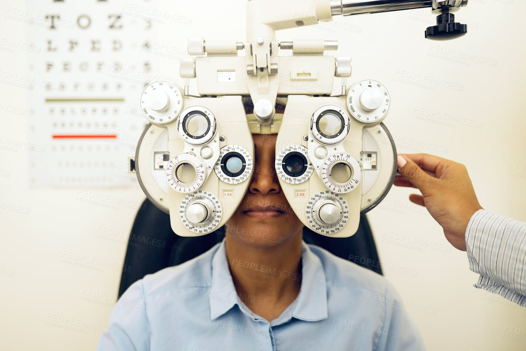 Buy stock photo Woman, eye exam and phoropter with optometrist hand, check and lens for vision, wellness and health in clinic. Doctor, eyesight tools and machine for assessment, consultation and glasses in hospital