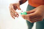 Hands, contact lens and container with vision and eye care, health and closeup with medical care or cosmetic. Optometry, wellness and healthcare with person and plastic case, visual and improvement