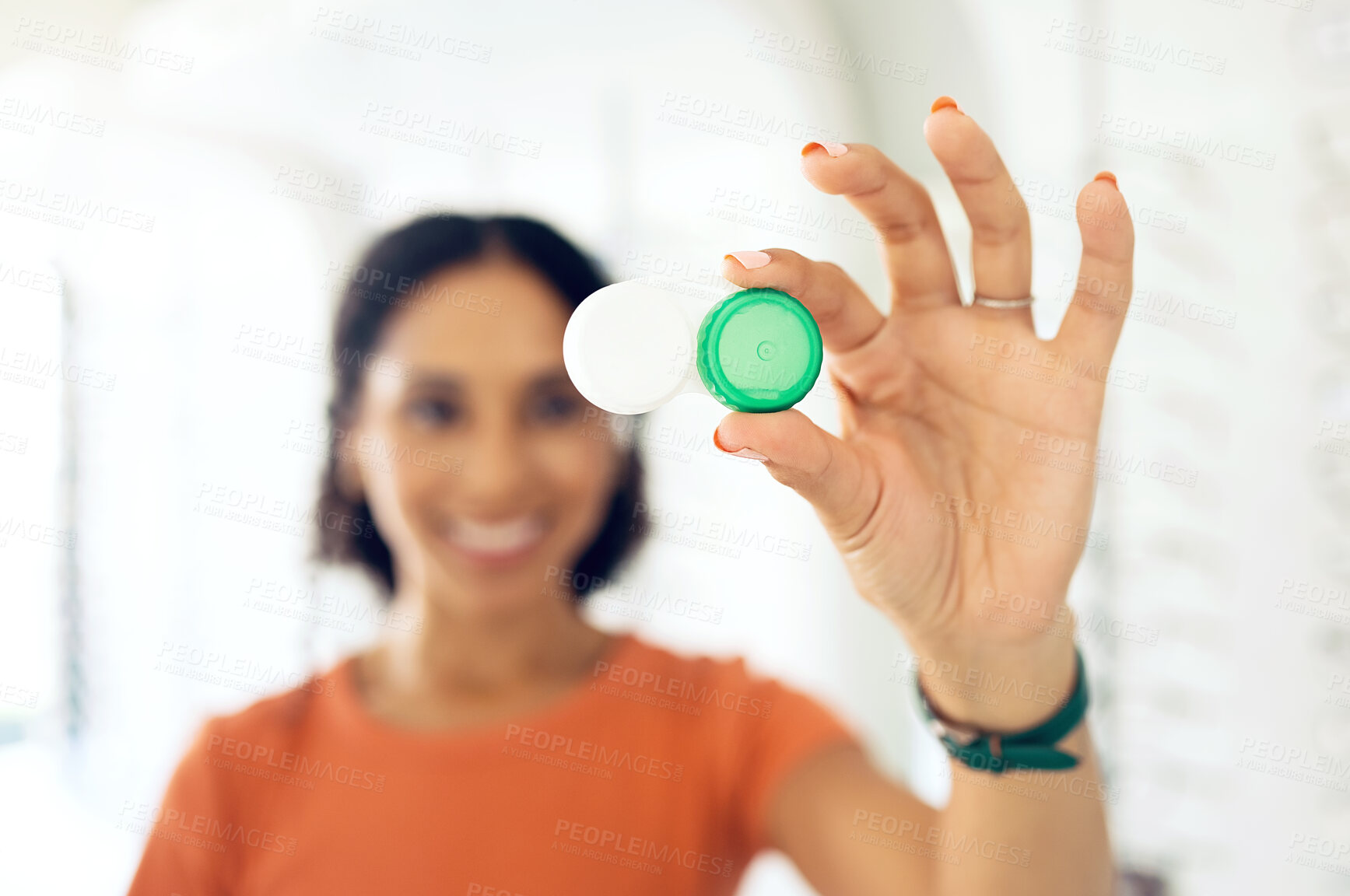Buy stock photo Hand, vision and contact lens container with a person at the optometrist for eye care or health closeup. Healthcare, medical and plastic case with a customer at the optician for a checkup appointment