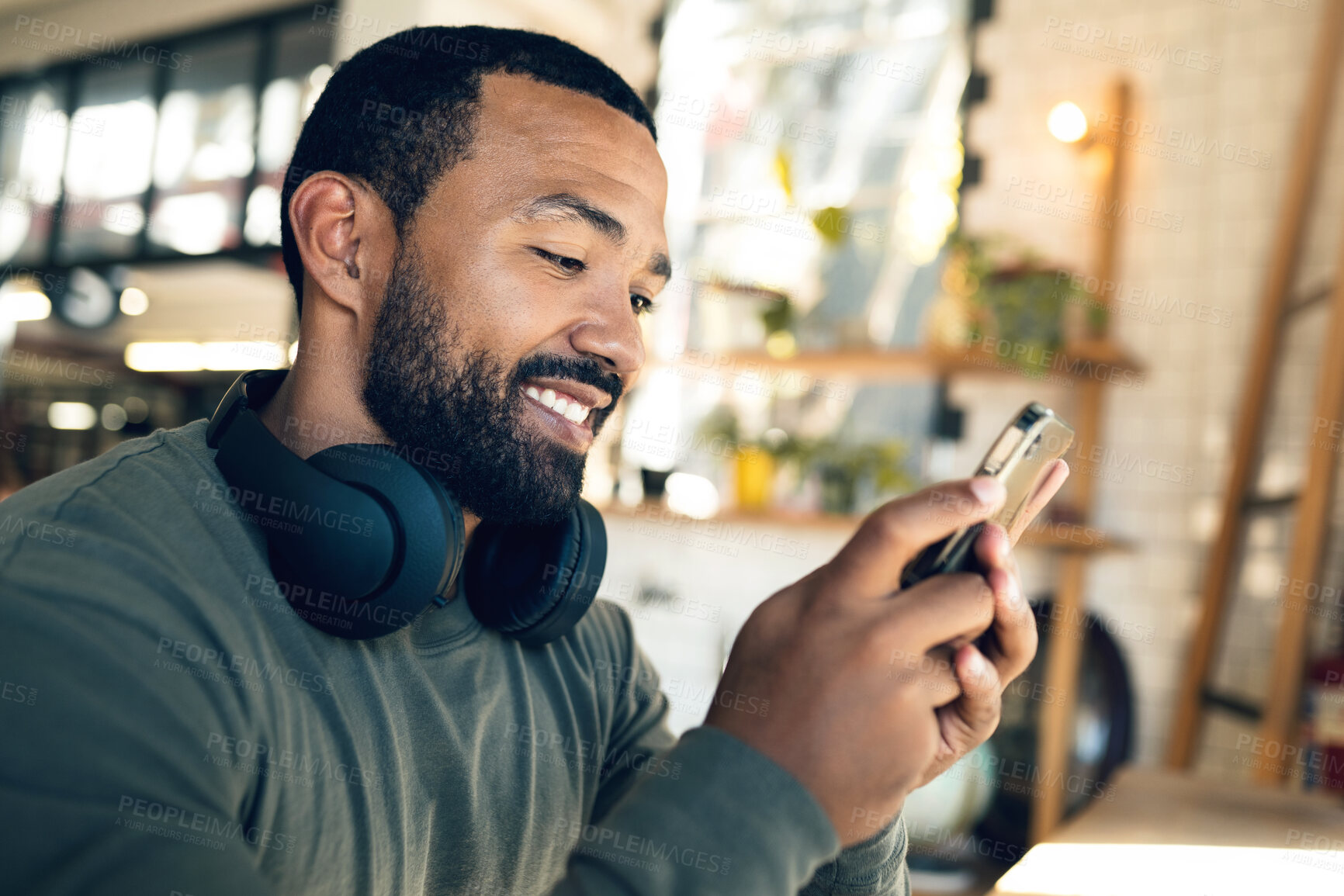 Buy stock photo Man, relax in cafe with smartphone and typing text or email, social media and online communication. Break at coffee shop, mobile app and scroll internet, search engine and chat with smile and tech