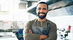 Happy man, face and small business owner in kitchen at restaurant for hospitality service, cooking or food. Portrait of male person, employee or waiter smile in confidence for professional culinary