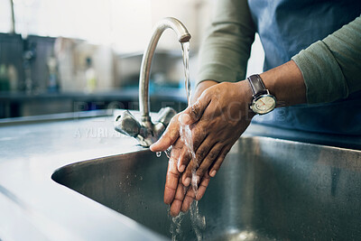 Buy stock photo Water, hygiene and washing hands in the kitchen with a person by the sink for health or wellness. Cleaning, safety and bacteria with an adult closeup in the home to rinse for skin protection