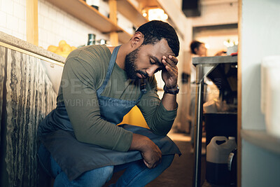 Buy stock photo Waiter man, coffee shop and tired with stress, headache or regret for mistake, fail or fatigue at job. Barista person, burnout and pain in head with anxiety, mental health or depression in restaurant