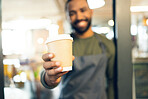 Coffee cup, hands and waiter in cafe offer drink, warm beverage and catering for hospitality services in startup. Closeup, restaurant barista and shop owner giving take away order of hot cappuccino 