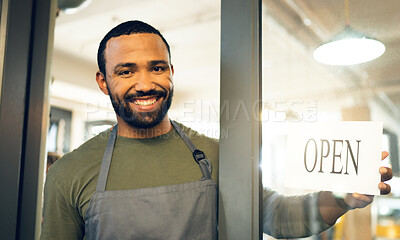 Buy stock photo Happy man, portrait and small business with open sign on door in ready for service or welcome at cafe. Male person, barista or waiter smile by entrance of coffee shop, restaurant or cafeteria store