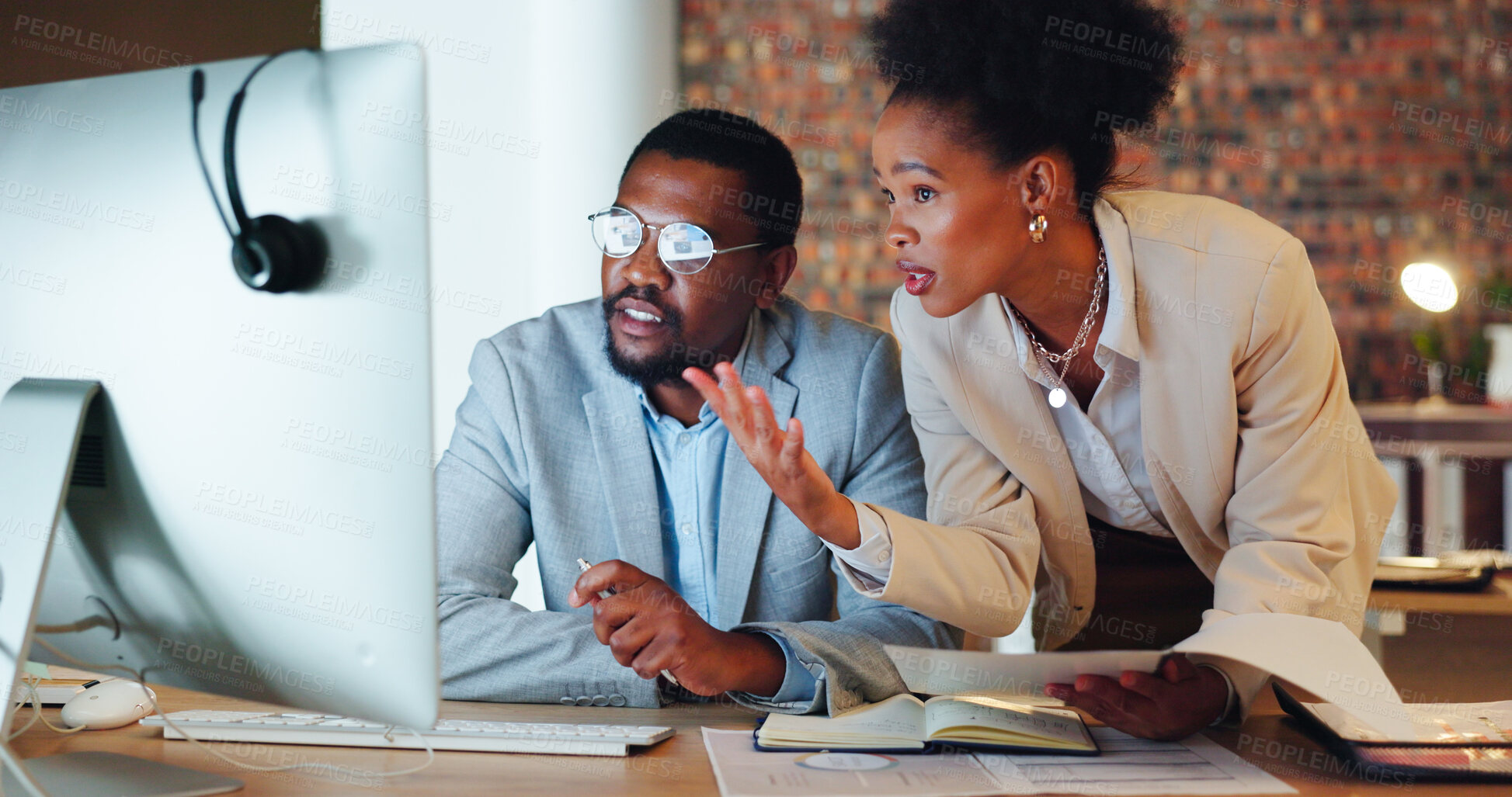 Buy stock photo Collaboration, confused and a mentor with an employee in the office at night for project management. Computer, teamwork or planning with a problem solving business man and woman working together