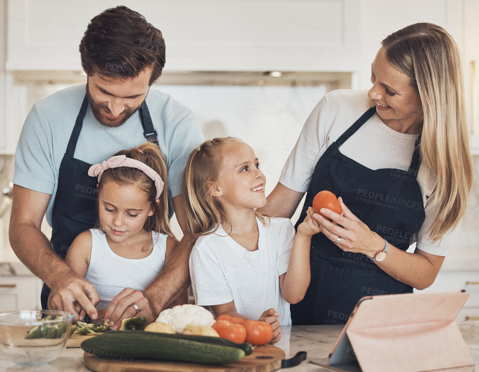 Buy stock photo Vegetables, cooking and family in kitchen together for bonding and preparing dinner, lunch or supper. Happy, smile and girl children cutting ingredients with parents for a healthy diet meal at home.