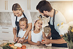 Kids, learning and happy family cooking in home, kitchen or together for dinner, food and healthy diet. Teaching, nutrition and chef parents with children for preparation of vegetables or lunch