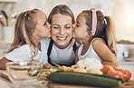 Kitchen, cooking and mother with girls, kissing and love with bonding, happiness and weekend break. Family, mama or children with mom, kids or ingredients with a smile, home or care with healthy food