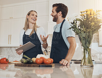 Buy stock photo Cooking, talking or happy couple with tablet or food for a healthy vegan diet together at home. Smile, vegetables or woman speaking in kitchen with love or man learning a dinner recipe on online blog