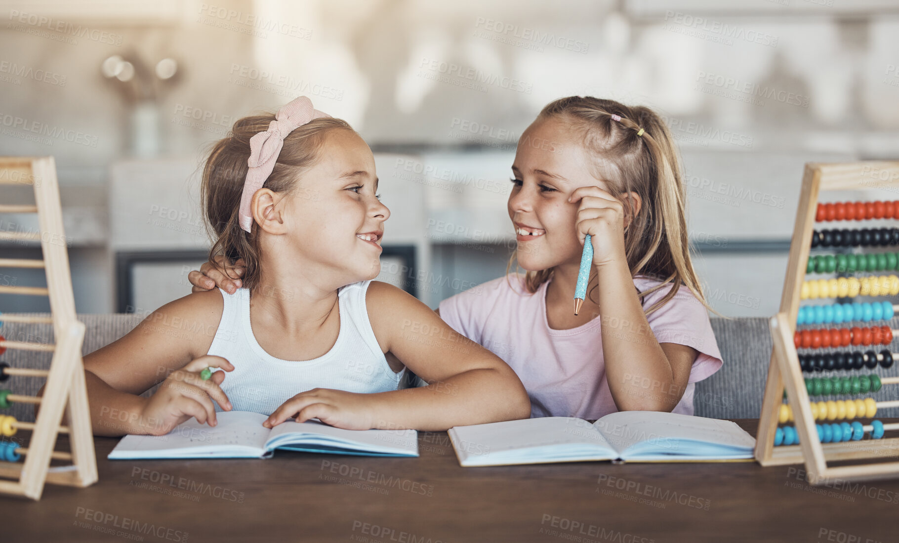 Buy stock photo Students, girl children and education, homework and abacus with studying and learning while at home. Happy kids, smile with friends or sister, help and support with books, math and numbers at table