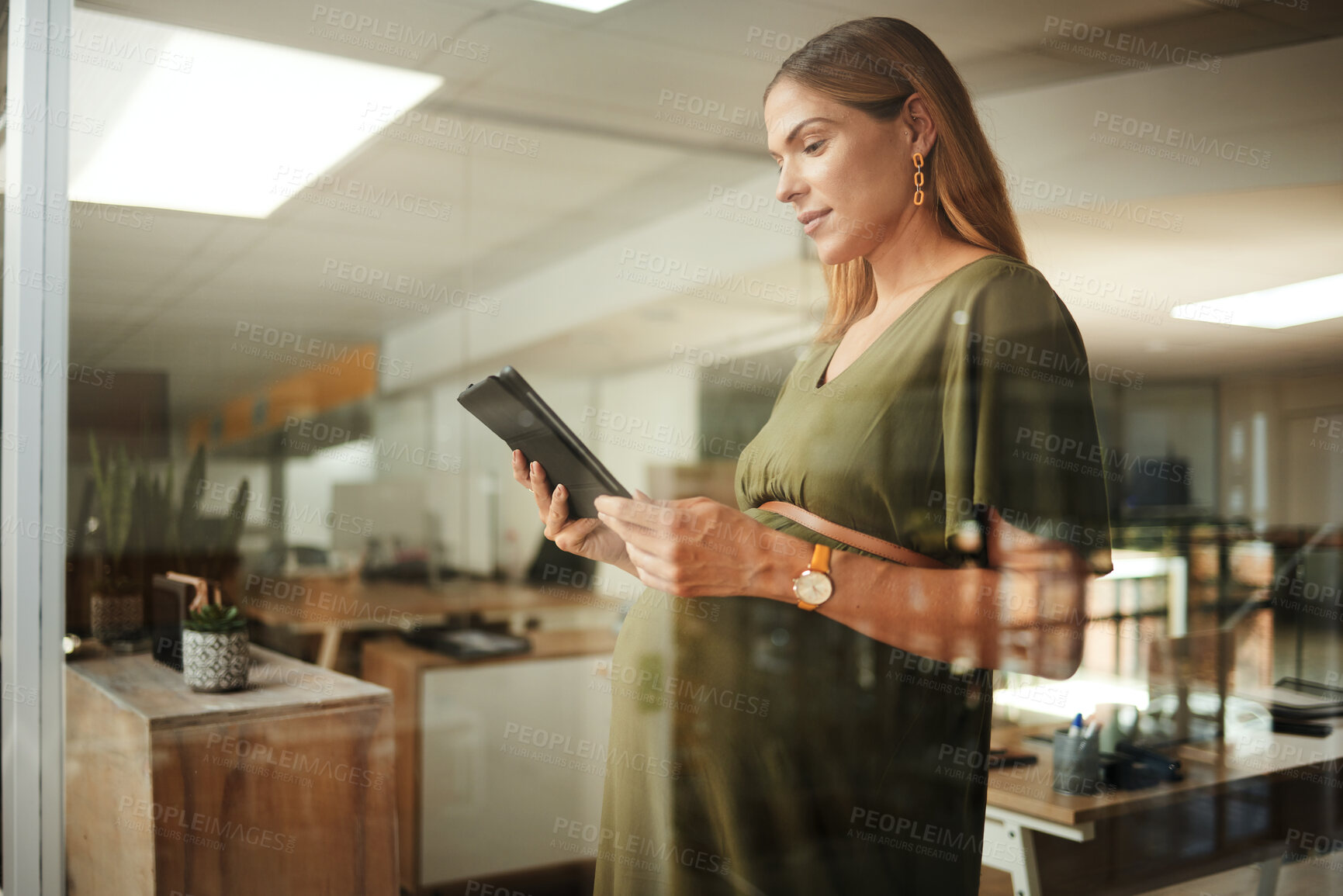 Buy stock photo Pregnant woman, reading and tablet in office for business, networking or ideas for marketing. Person, touchscreen and thinking at work for communication, research or internet chat at company