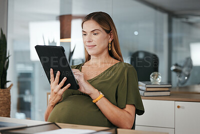 Buy stock photo Tablet, networking or pregnant business woman in office on social media, website or internet at desk. Maternity, communication or female designer with pregnancy or technology to scroll in workplace