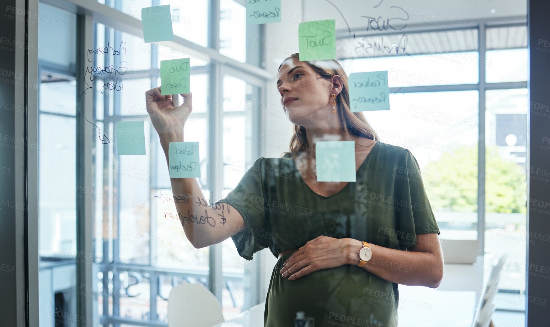 Buy stock photo Pregnant woman, writing and glass in office for plan, sticky note or thinking for vision, idea or goal. Solution, brainstorming or problem solving for strategy, market research or board with person