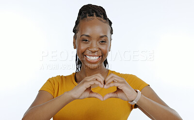 Buy stock photo Woman, portrait and hands with heart emoji for love, support and happiness on white background in studio. Black person, smile and hand gesture for care or kindness, trust and motivation in closeup