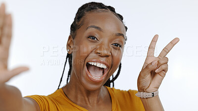 Buy stock photo Excited, face and selfie, black woman and peace hand sign with memory and social media on white background. Smile for profile picture, live streaming and influencer with content creation in studio