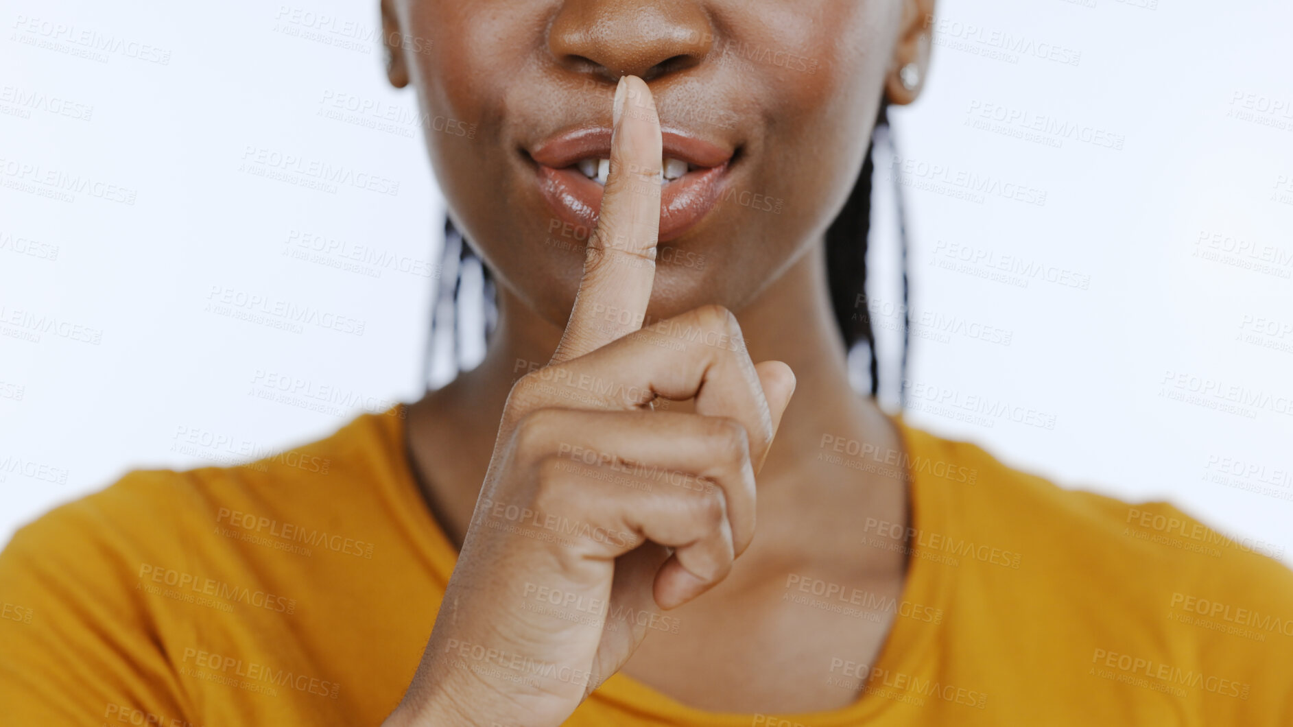 Buy stock photo Secret, finger to lips and black woman in studio for privacy, confidential information and face on white background. Mouth zoom, quiet and silence gesture with emoji, gossip or whisper with news 