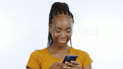 Buy stock photo Black woman, smartphone and chat, social media and communication online with internet search in studio. Contact, technology and mobile app, subscription with text message or email on white background