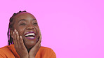 Woman, hands and smile on face with happy emoji, excited and cheerful expression by pink background in studio. Black person, positive deal and self love promotion with success and mockup in close up 