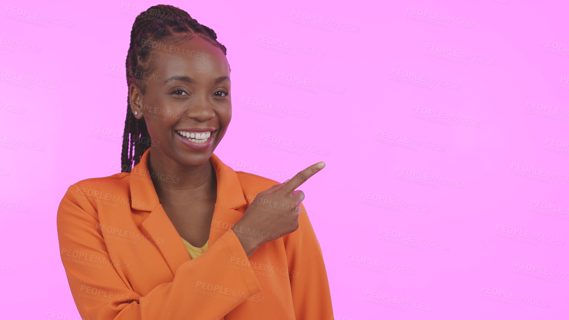 Buy stock photo Black woman, smile and pointing for advertising in studio on blank mock up space for presentation. Portrait, happy or person with promotion for business, marketing or offer on pink background