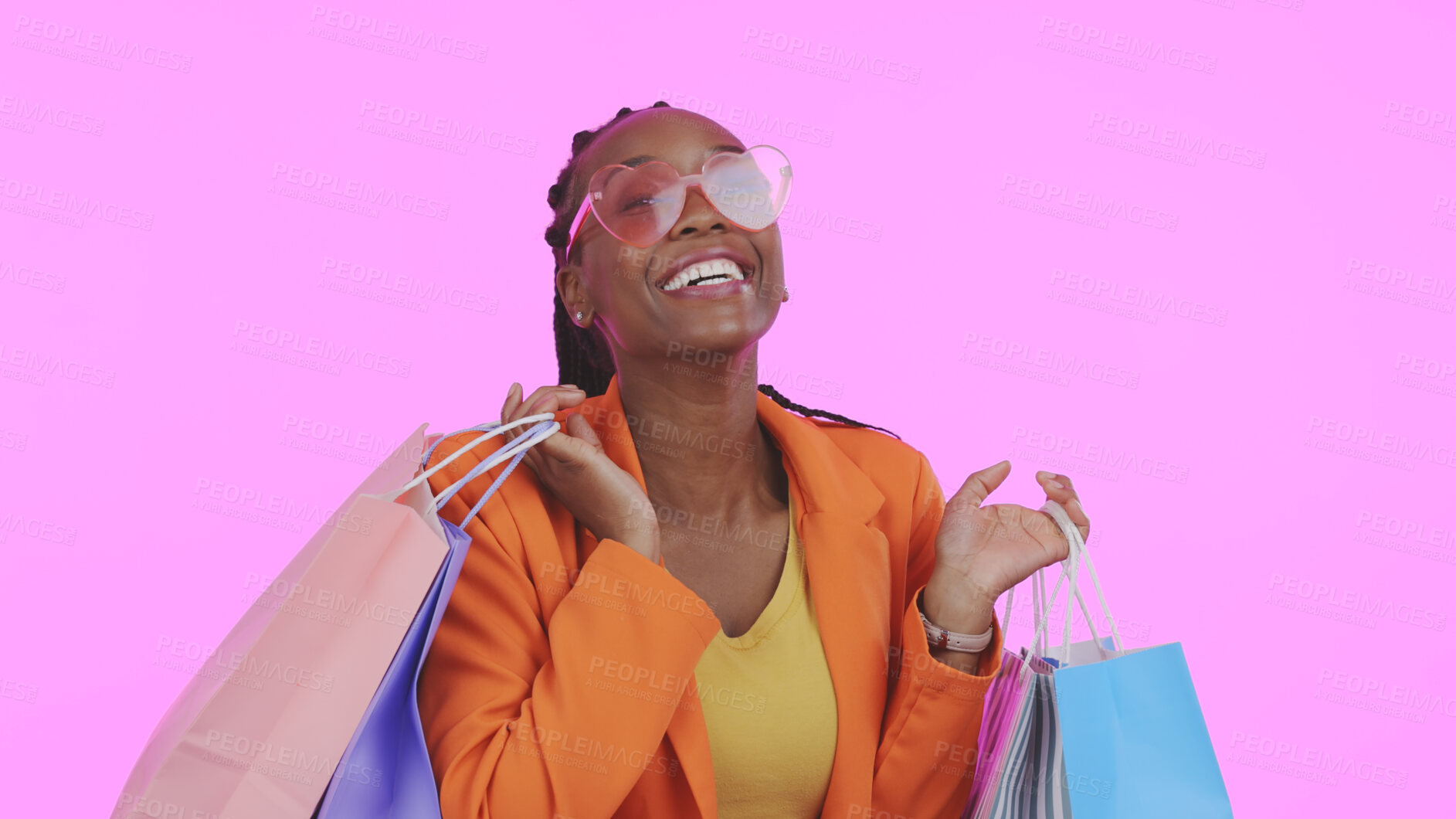 Buy stock photo Woman, shopping bag and sunglasses for fashion sale, discount and giveaway prize or competition in studio. Portrait of african person or excited customer with gift or funky style on pink background