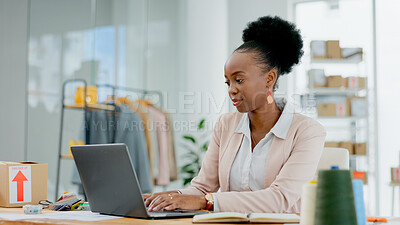 Designer, laptop or small business in fashion boutique for stock delivery, schedule or project research. Online, web or black woman typing on app or technology for social media or ecommerce update