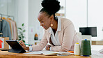 Happy black woman, laptop and fashion designer in logistics, small business or schedule delivery at boutique. African female person smile working on computer in supply chain, clothing or inventory