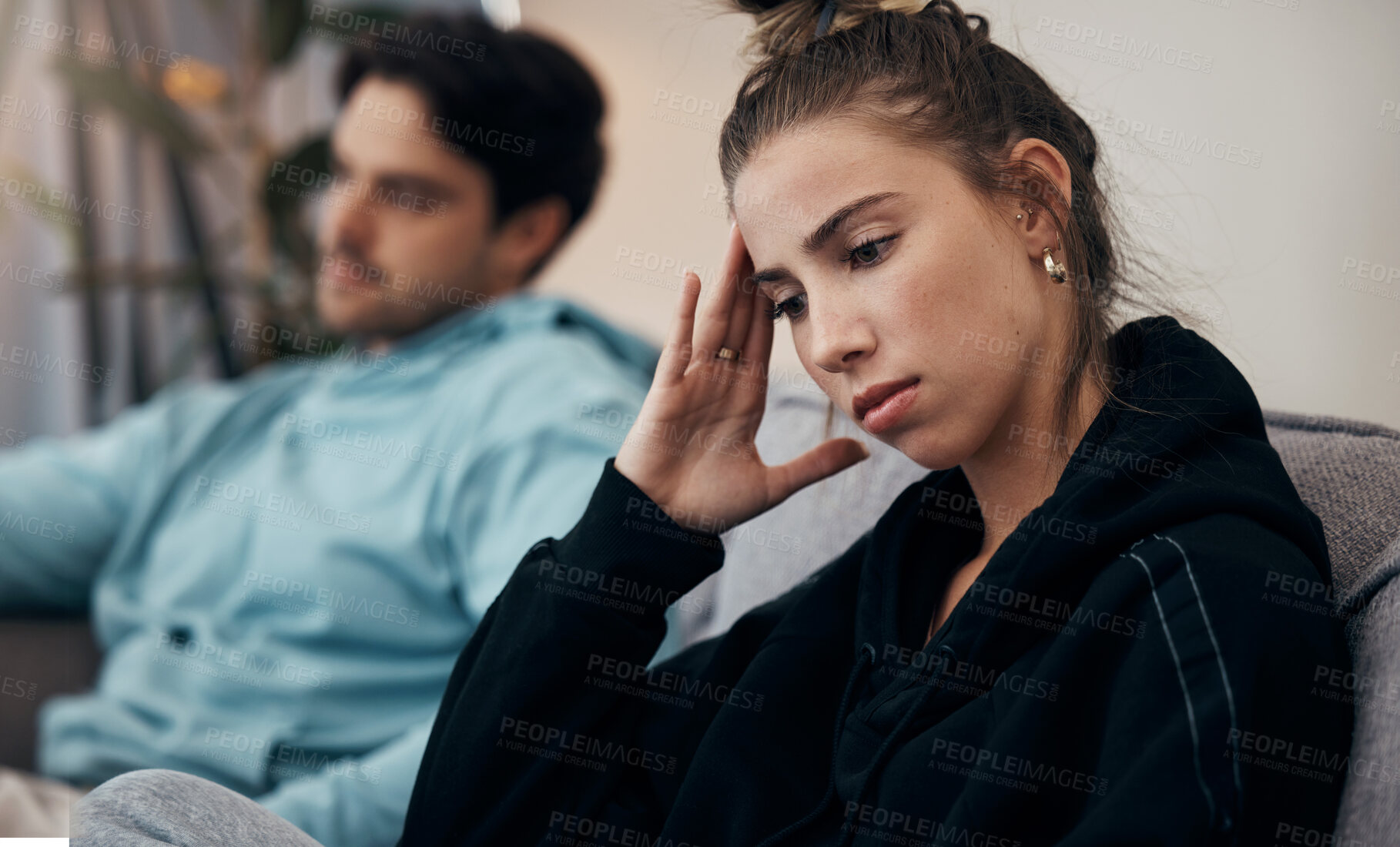 Buy stock photo Frustrated couple, headache and fight on sofa in divorce, disagreement or conflict in living room at home. Man and woman in toxic relationship, cheating affair or dispute on lounge couch at house