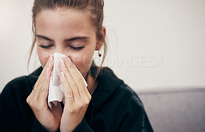 Buy stock photo Woman, sick and couch with tissue, sickness and virus for infection, sinus and cold symptoms. Sneeze, blowing nose and allergy in living room sofa, hayfever and healthcare for disease, fever or alone