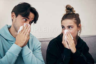 Buy stock photo Couple, sick and virus with tissue, sofa and sickness for infection, sinus and cold symptoms. Sneeze, blowing nose and allergy in living room couch, hayfever and healthcare for disease, man and woman