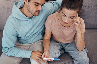 Buy stock photo Couple, pregnancy test and stress on sofa infertility, anxiety or support man. Woman, or male person or frustrated ovulation news or waiting information fear for loss, relationship problem or comfort