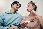 Couple, pregnancy test and stress in home for infertility, anxiety or support. Woman, or male person or frustrated ovulation news or waiting information fear for loss, relationship problem or comfort