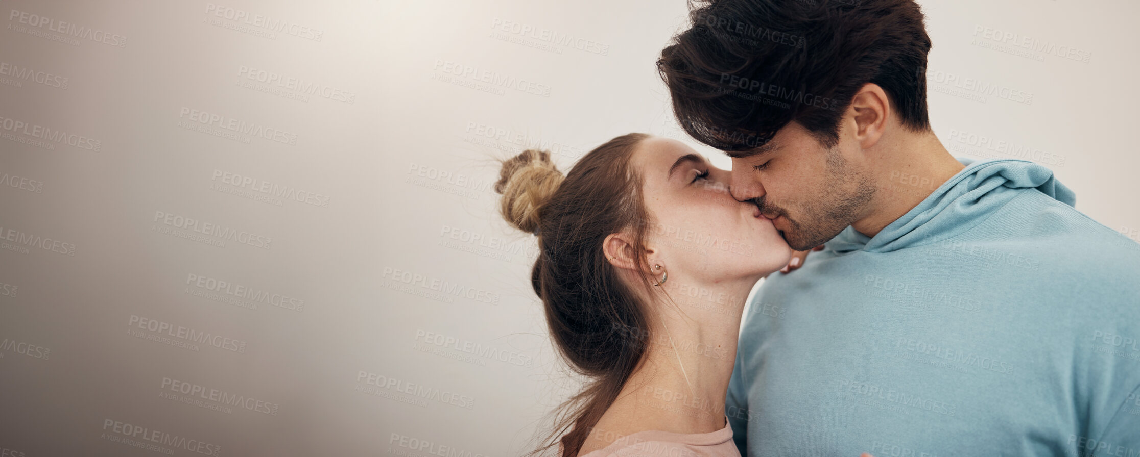 Buy stock photo Happy, couple and kiss with love in banner, white background or studio mockup of partnership, loyalty or marriage. Romantic, people or bonding with partner in affection with support and care together
