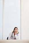 Portrait, doctor and smile with a woman in a hospital for healthcare, consulting or trust on space. Medical, mockup and a happy young medicine professional at a desk in a clinic for cardiology