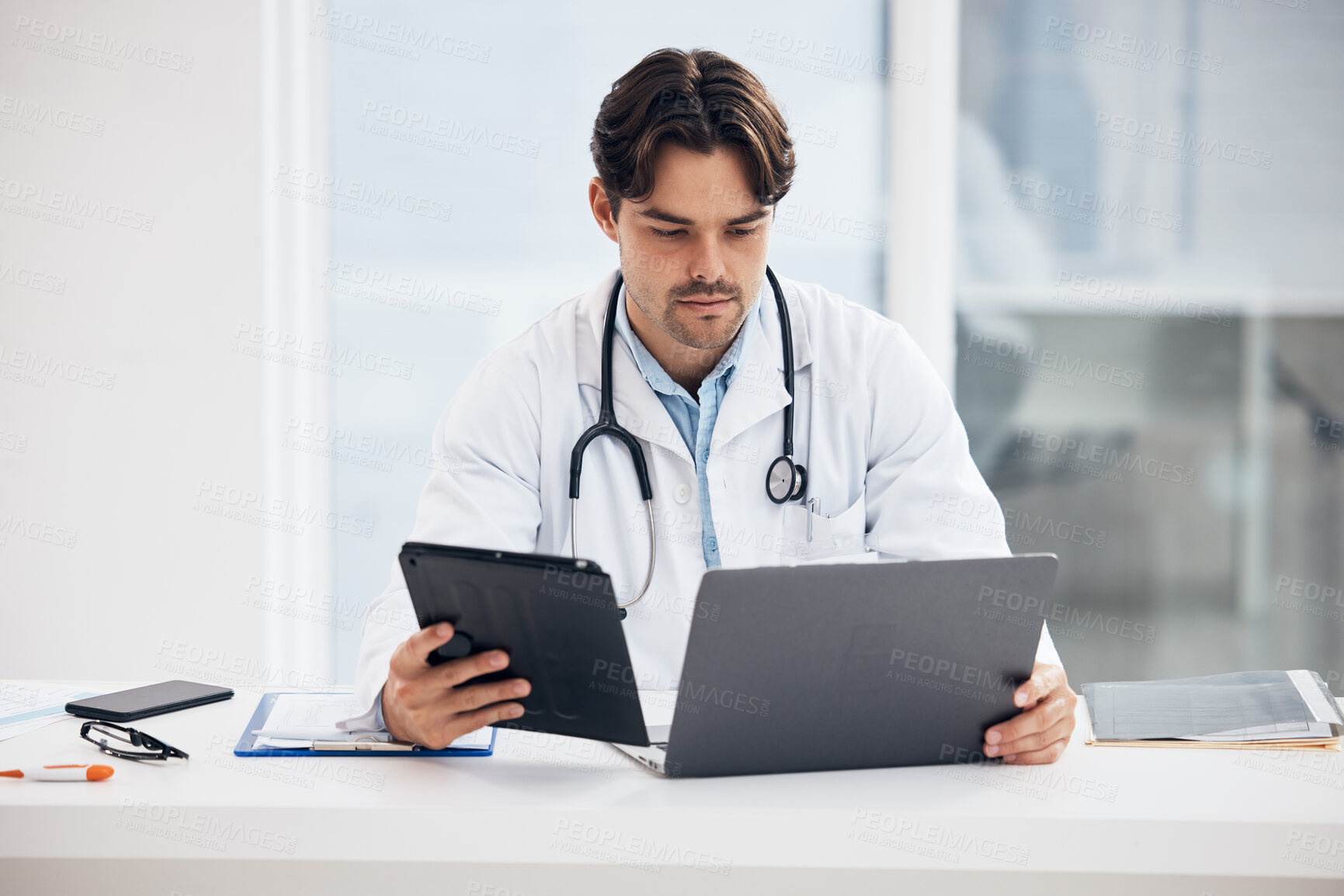Buy stock photo Laptop, man or doctor on tablet for research, medical update or telehealth web service in clinic. Reading news info, PC or surgeon in professional healthcare with digital tech for email in hospital 