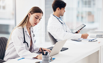 Buy stock photo Doctors, healthcare and coworkers working at desk for planning, research and medical schedule at workspace in hospital. Medicine, man and woman with collaboration, teamwork or brainstorming results