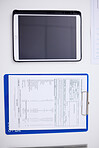Above, table, tablet and healthcare report at a hospital with results for a chart and medical paperwork. Desk, clinic work and technology for communication with a document for insurance in office