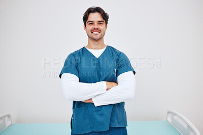 Buy stock photo Portrait, doctor and arms crossed for smile in space for health, treatment or wellness. Happy man, nurse and scrubs for career in medicine with emergency care, cardiology or rehabilitation in clinic
