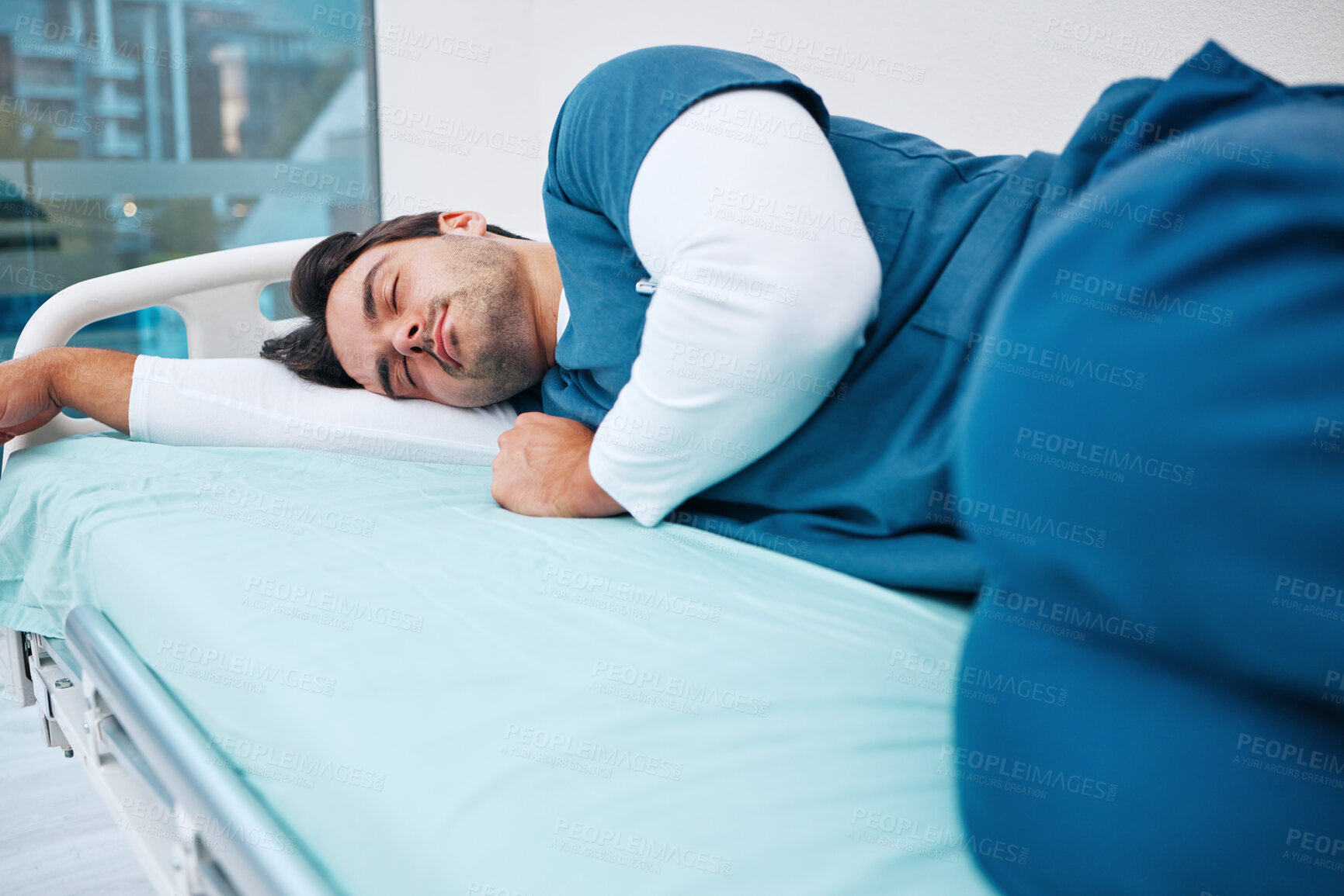 Buy stock photo Sleeping, hospital and tired doctor for rest, nap and break for burnout, exhausted and fatigue. Healthcare, night shift and health worker relax for medical service, wellness and stress in clinic bed