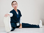 Stretching, legs and nurse with feet on floor in exercise, pilates or start of shift in clinic and healthcare. Work, preparation and warm up body for wellness, meditation and fitness in hospital