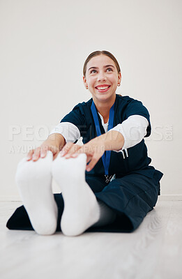 Buy stock photo Stretching, legs and nurse with feet on floor in exercise, pilates or start of shift in clinic and healthcare. Work, preparation and warm up body for wellness, meditation and fitness in hospital
